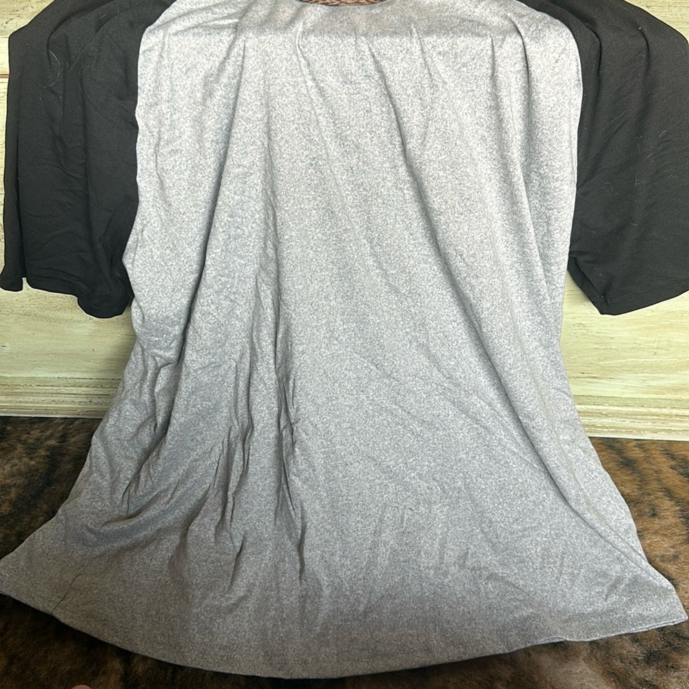 Black and grey T-shirt short sleeve size large barely worn good condition